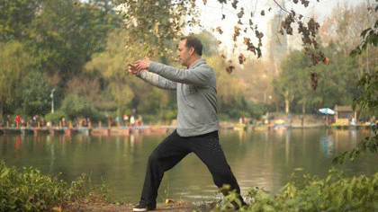 Lee Holden Doing Qi Gong in China on a Lake